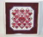 Quadruple matted needlepoint piece